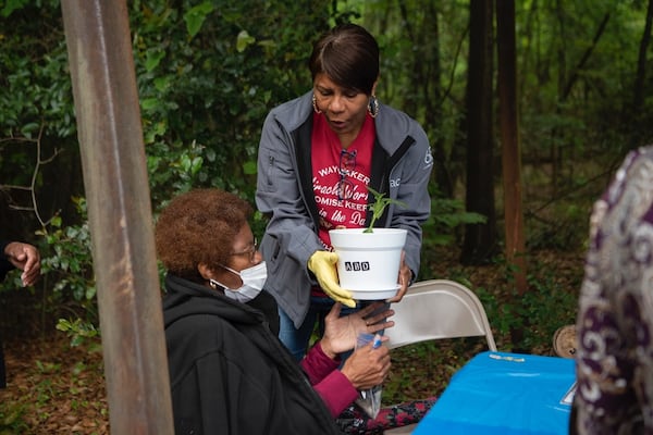 After Sunday services at Peters Chapel in Columbus, Georgia, Annie Dixon and her daughter Tanya Dixon join in a gardening activity. (Photo Courtesy of Shereen Ragheb)