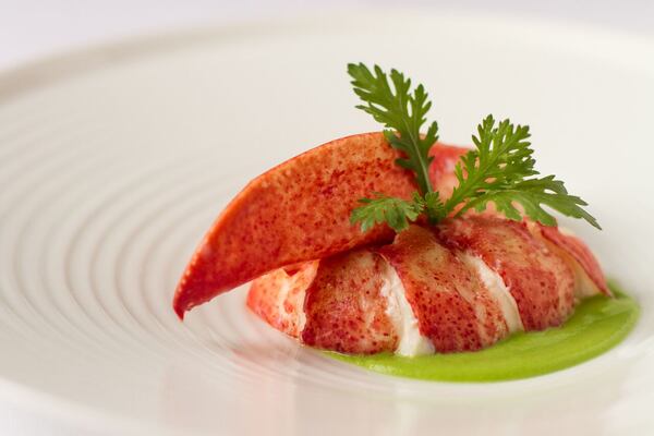  Butter-braised lobster is one of the greatest hits at Aria in Buckhead. / George Sanchez