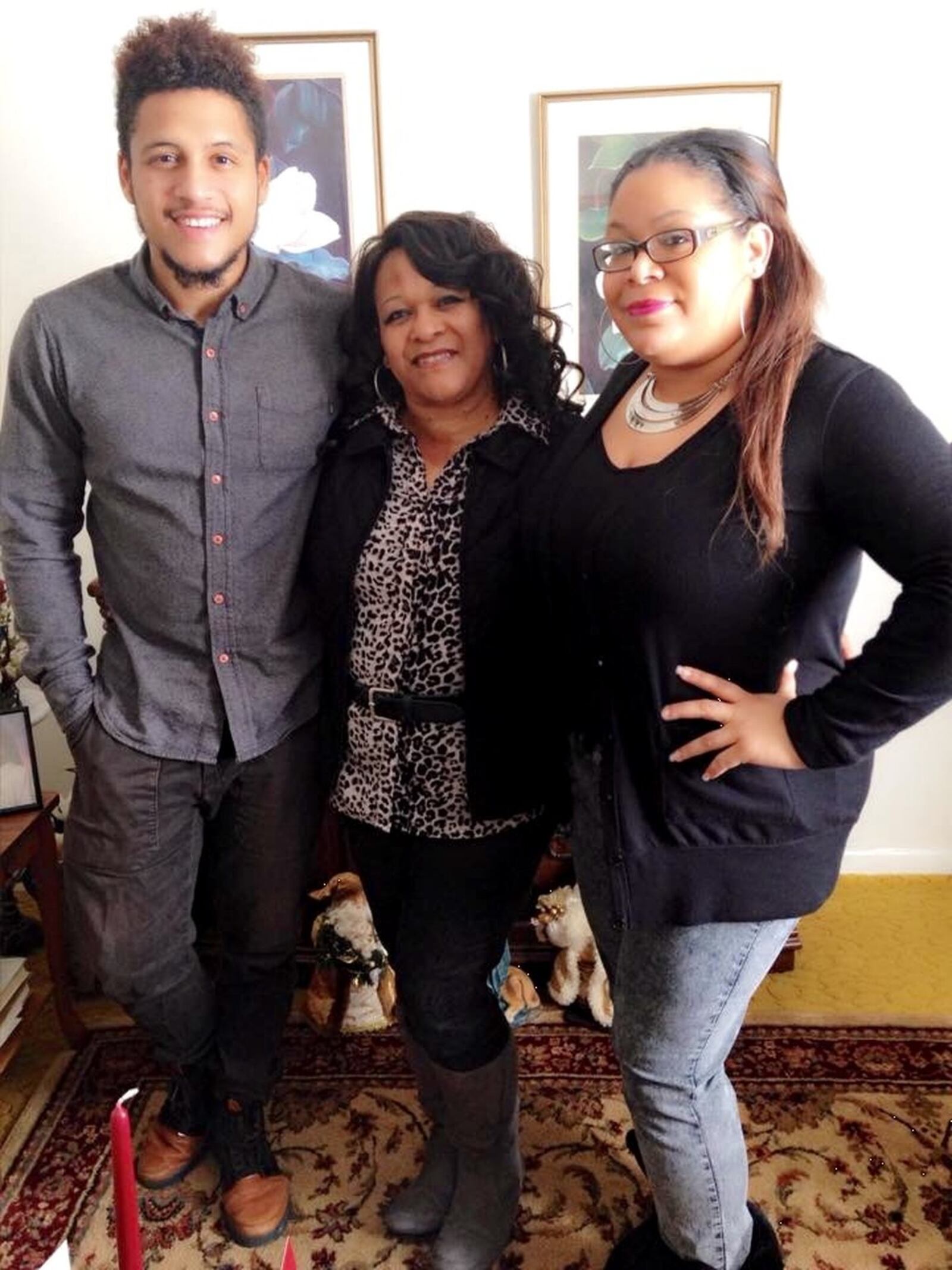 Anthony Hill is shown with his mother and sister in this family photo from Christmas 2014. It was the last time his family saw Anthony.