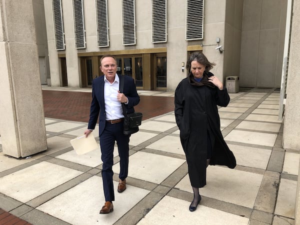 Jeff Binkley, left, of Dunwoody and lobbyist Marnie George met with Florida lawmakers in February 2019 before the start of that state’s legislative session to inform them about Maura’s Voice, a research foundation started in memory of Binkley’s 21-year-old daughter Maura. Maura Binkley was killed at a yoga studio in Tallahassee, Fla., on Nov. 2, 2018. J. SCOTT TRUBEY/STRUBEY@AJC.COM