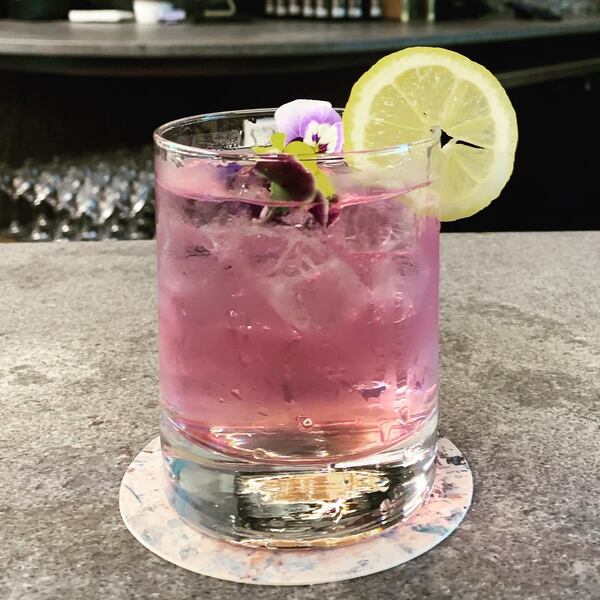 Distillery of Modern Art's vodka tonic gets its color from blue pea flower provided by Chamblee's Zen Tea. Angela Hansberger for The Atlanta Journal-Constitution