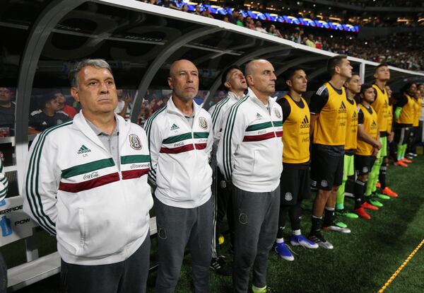 Former Atlanta United manager Gerardo Martino (left) leads the Mexico team against Venezuela in Atlanta.  Curtis Compton/ccompton@ajc.com