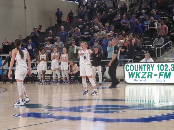 Lumpkin County's Lexi Price directs players toward mid-court at the instructions of Indians coach David Dowse, moments before the team celebrated their 62-42 win over Westminster in the Class 3A semifinals, held March 5, 2022 at Georgia College and State University's Centennial Center.