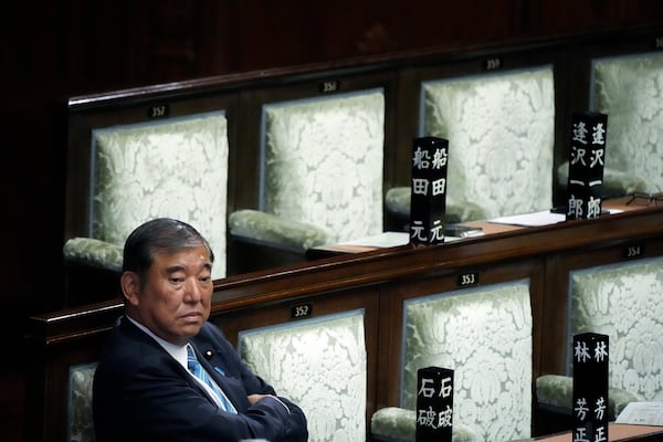 FILE - Japanese Prime Minister Shigeru Ishiba waits after the first vote for a new prime minister at a special parliamentary session of the lower house Monday, Nov. 11, 2024, in Tokyo. (AP Photo/Eugene Hoshiko, file)