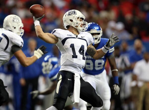 Old Dominion quarterback Taylor Heinicke, a Collins Hill graduate, passed for 351 yards with three touchdowns and three interceptions in ODU's 53-27 victory.