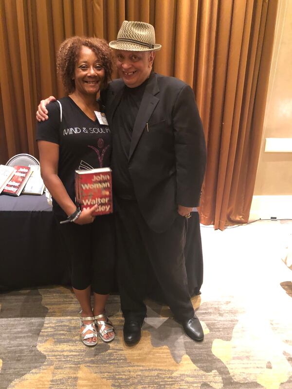 Reader and local book club president Katrina Williams with author Walter Mosley at the 2019 National Book Club Conference.