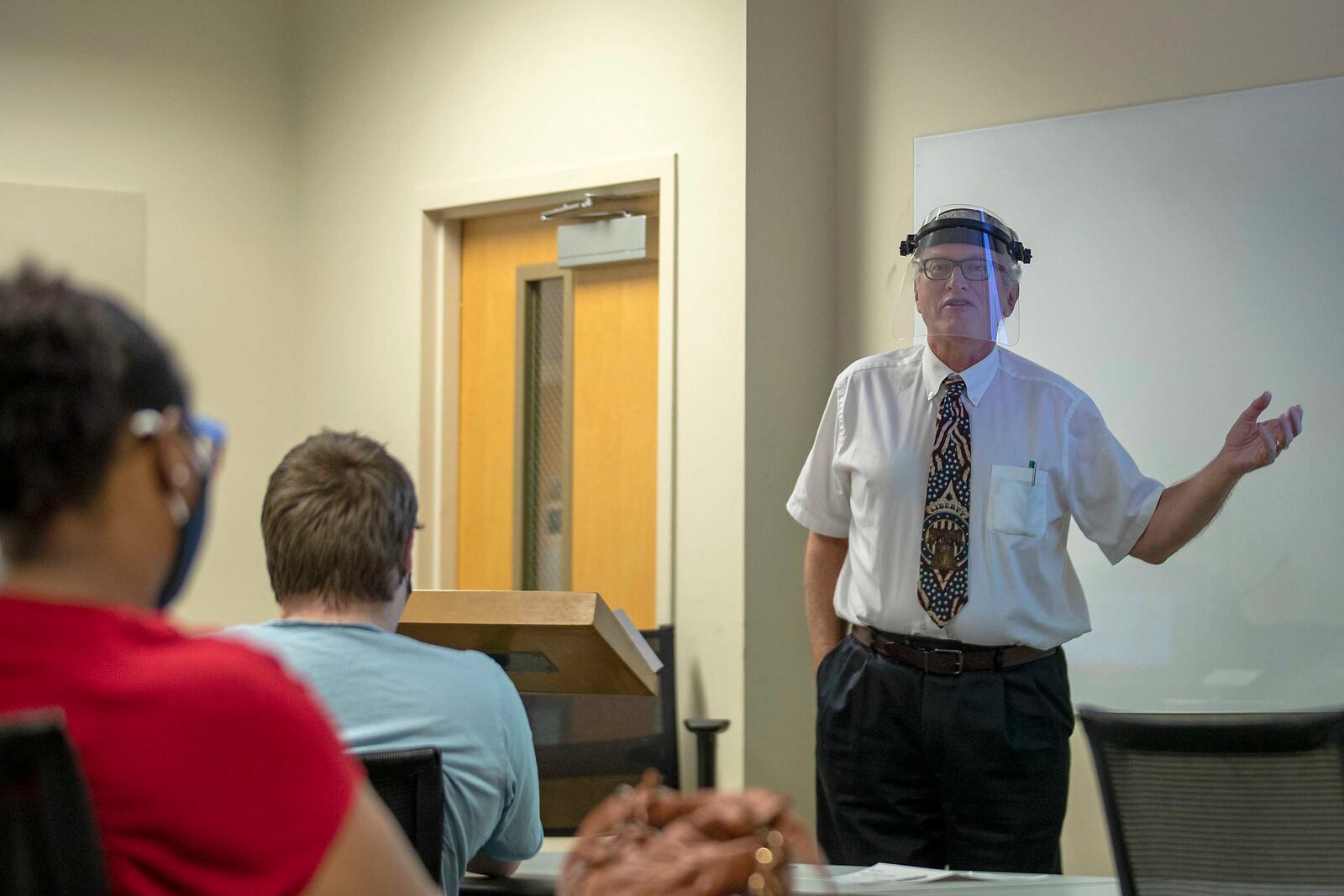 09/15/2020 - Augusta, Georgia - Prof. Hubert van Tuyll teaches U.S. History to a classroom of students on Augusta UniversityÕs Summerville campus in Augusta, Tuesday, September 15, 2020. Van TuyllÕs wife, Debbie, is also a professor at the university but only teaches virtually due to a medical condition. Debbie was diagnosed with breast cancer May 2020. Due to the risk of possibly exposing himself and his wife to COVID-19, Hubert has requested to teach remotely. He currently teaches ever other week at the campus. (Alyssa Pointer / Alyssa.Pointer@ajc.com)