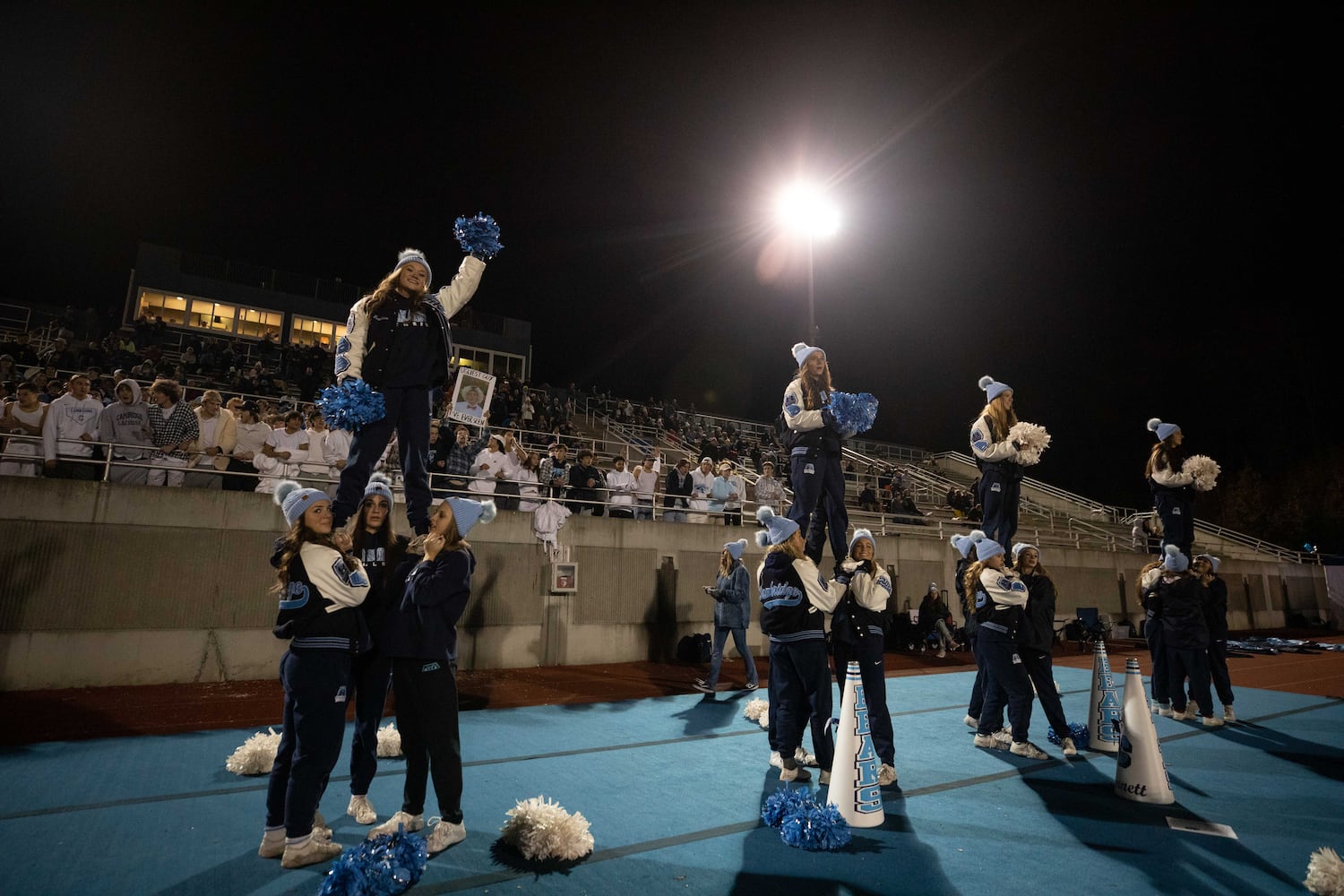 Cambridge cheerleaders cheer during a GHSA high school football game between Cambridge and South Paulding at Cambridge High School in Milton, GA., on Saturday, November 13, 2021. (Photo/Jenn Finch)