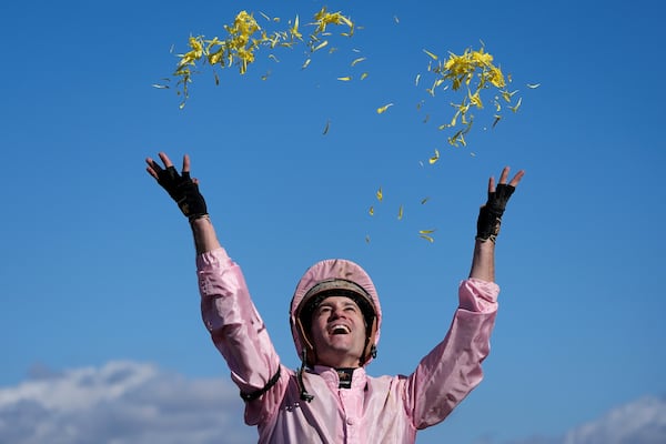 Flavien Prat celebrates after riding Sierra Leone to victory in the Breeders' Cup Classic horse race in Del Mar, Calif., Saturday, Nov. 2, 2024. (AP Photo/Gregory Bull)