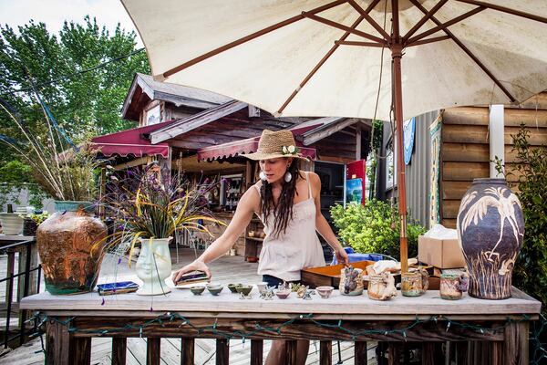 Potter and artist Mathilda Tanner sets up her wares in downtown.