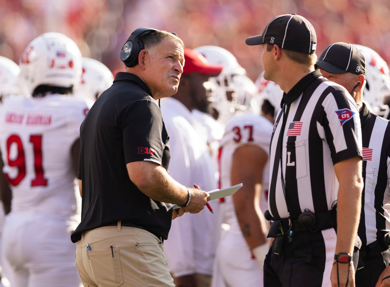 Rutgers head coach Greg Schiano looks up to the scoreboard during a timeout against Nebraska during the first half of an NCAA college football game Saturday, Oct. 5, 2024, in Lincoln, Neb. (AP Photo/Rebecca S. Gratz)