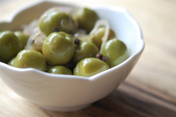 Syrian sweet-and-sour olives are an integral part of a Middle Eastern mezze. (Styling and photo by Meridith Ford for The Atlanta Journal-Constitution)