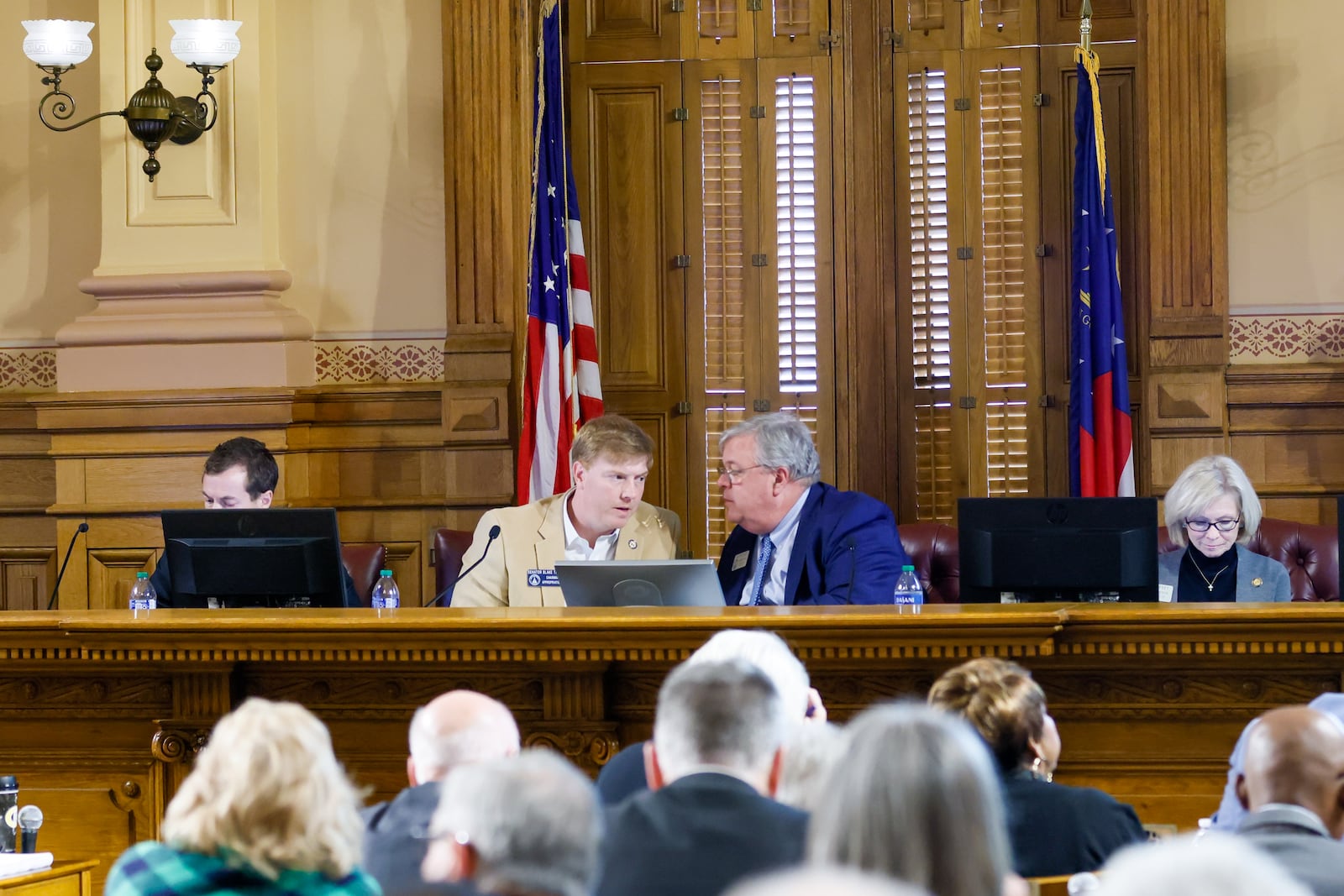 State Senate Appropriations Chairman Blake Tillery, left, and House Approprations Chairman Matt Hatchett confer Tuesday during a budget hearing. (Arvin Temkar / arvin.temkar@ajc.com)