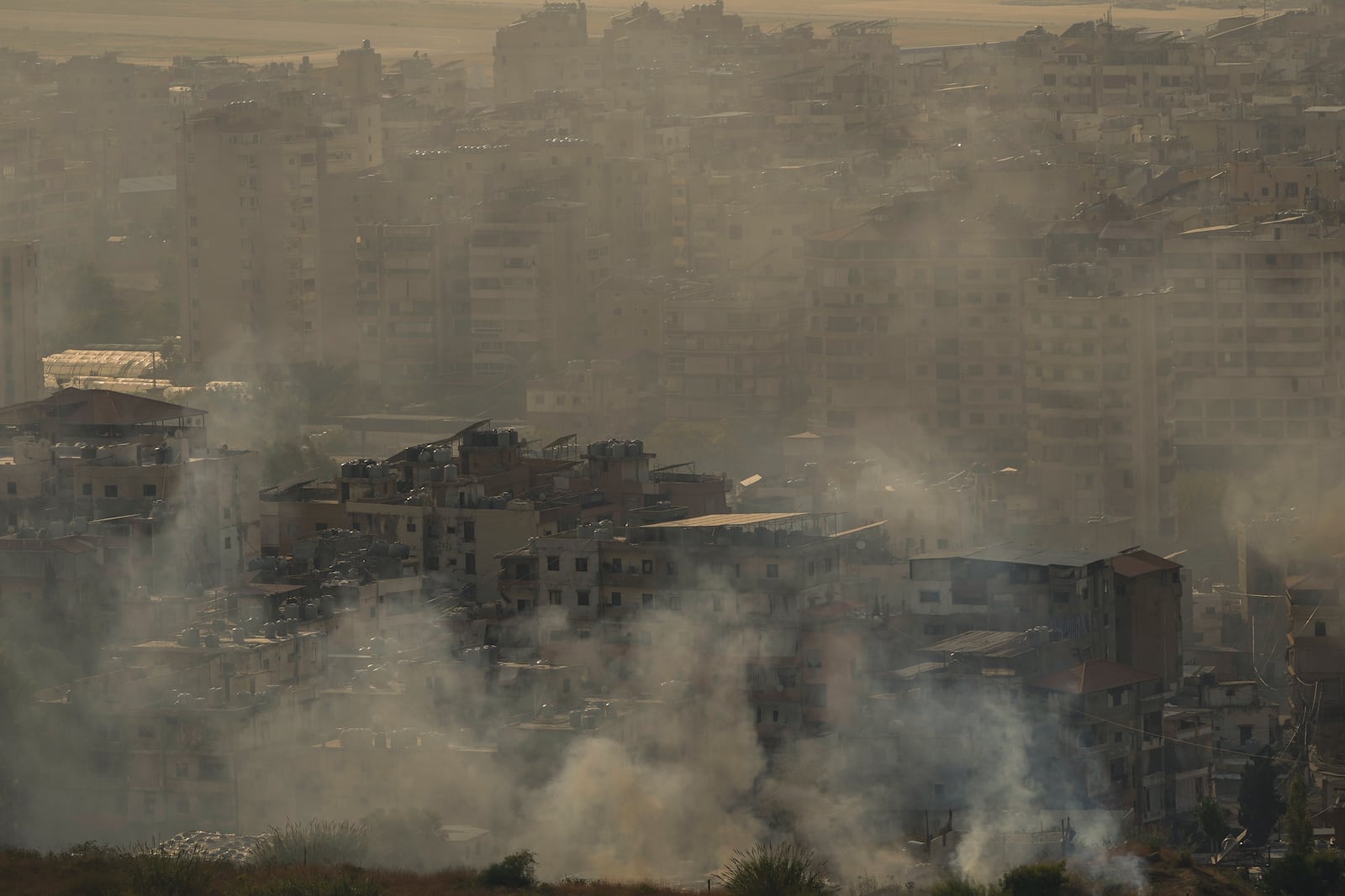 Smoke rises from the site of an Israeli airstrike in Dahiyeh, Beirut, Lebanon, Lebanon, Sunday, Oct. 27, 2024. (AP Photo/Hassan Ammar)