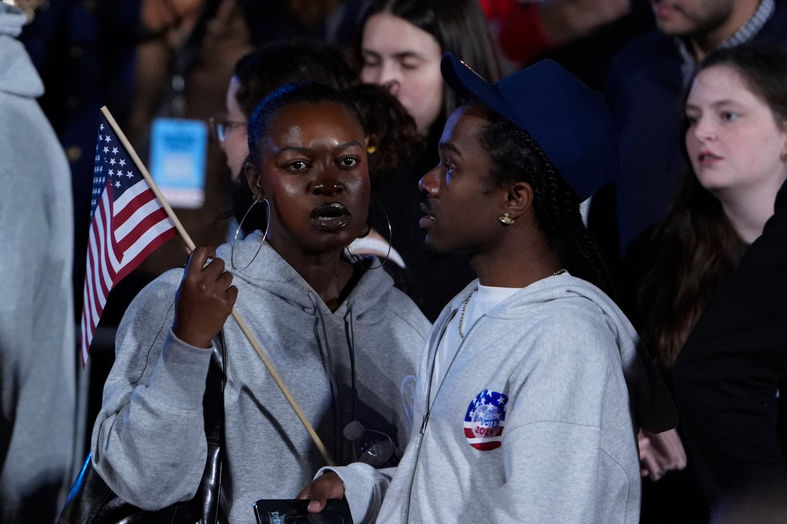 Supporters of Democratic presidential nominee Vice President Kamala Harris leave an election night campaign watch party after it was announced that she would not speak on Wednesday, Nov. 6, 2024, on the campus of Howard University in Washington. (AP Photo/J. Scott Applewhite)