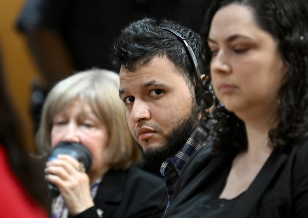 Jose Ibarra listens to an interpreter during a Nov. 12 court hearing in Athens.