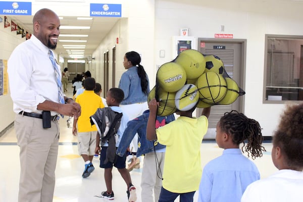 Tony Ford, principal at Perkerson Elementary School, one of Atlanta’s turnaround schools, talks to students in August 2018. Jenna Eason / Jenna.Eason@coxinc.com