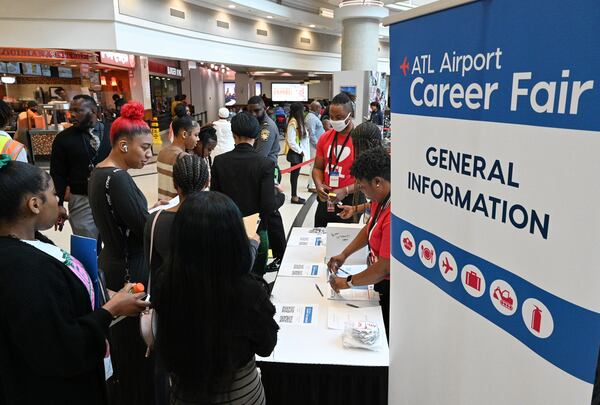 Job seekers check in as they enter 2023 ATL Airport Career Fair at the domestic terminal atrium of Hartsfield-Jackson Atlanta International Airport, Wednesday, March 8, 2023, in Atlanta, Ga. (Hyosub Shin / Hyosub.Shin@ajc.com)