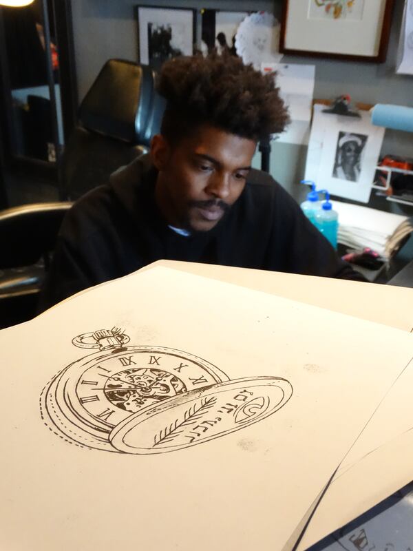 Corey Davis' pocket watch design. CREDIT: Rodney Ho/ rho@ajc.com