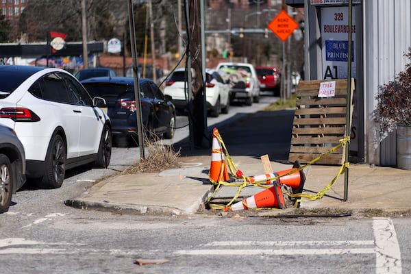 A damaged part of the sidewalk on Boulevard SE in Feb. 2025. 