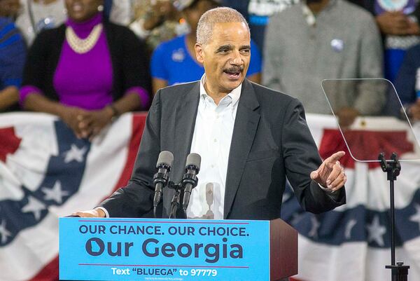 Former U.S. Attorney General Eric Holder speaks during a rally for gubernatorial candidate Stacey Abrams in Forbes Arena at Morehouse College, Friday, November 2, 2018.  (ALYSSA POINTER/ALYSSA.POINTER@AJC.COM)