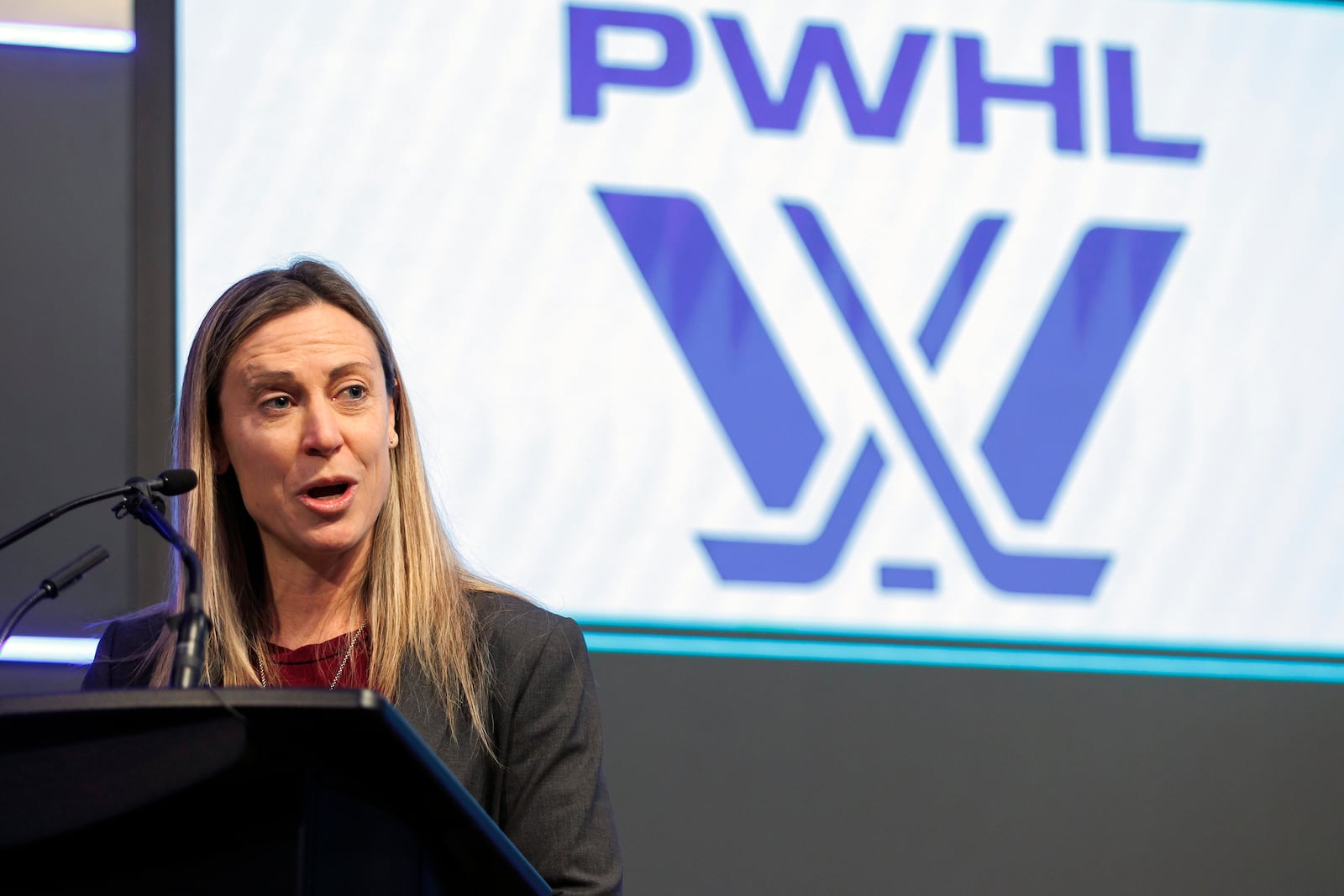 FILE - Professional Women's Hockey League senior vice president of hockey operations Jayna Hefford speaks before the PWHL Toronto team opened the Toronto Stock Exchange in Toronto, Jan. 12, 2024. (Cole Burston/The Canadian Press via AP, File)