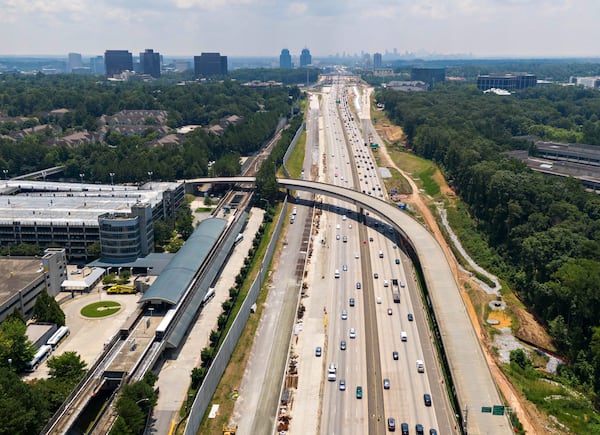 July 22, 2021 Sandy Springs - Aerial photo shows Ga. 400 (L-Northbound, R-Southbound), where toll lanes could be built on Thursday, July 22, 2021. North Springs MARTA station is shown on left. S. (Hyosub Shin / Hyosub.Shin@ajc.com)