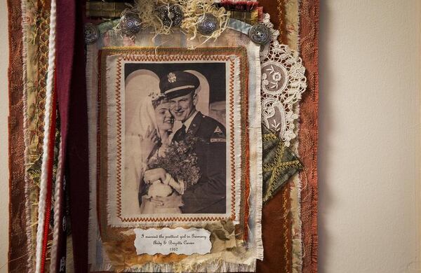 Andy Carver’s late wife, Brigitte, clutches a bouquet of white carnations in a wedding day photo that hangs in Carver’s residence at Lakeline Oaks Retirement Resort. A caption reading “I married the prettiest girl in Germany” is attached below the photo. (Photo: Nick Wagner/Austin American-Statesman)