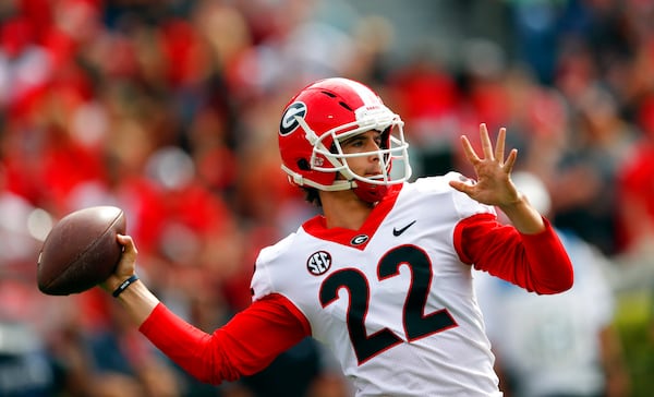 Walk-on quarterback Stetson Bennett (22) throws a pass during during the first half of Georgia's annual G Day inter squad spring football game Saturday, April 21, 2018, in Athens, Ga. (AP Photo/John Bazemore)