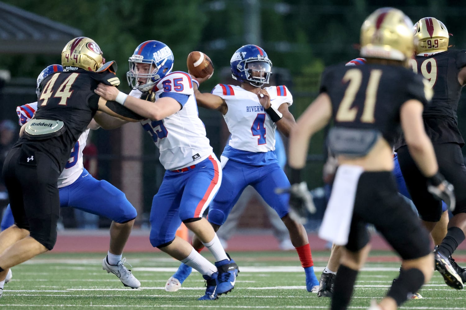 Sept. 24, 2021 - Johns Creek, Ga: Riverwood quarterback Avery Smith (14) attempts a pass during the first half against Johns Creek at Johns Creek high school Friday, September 24, 2021 in Johns Creek, Ga.. JASON GETZ FOR THE ATLANTA JOURNAL-CONSTITUTION