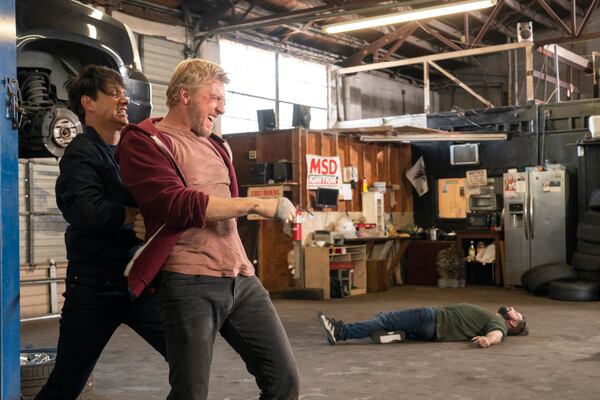 Ralph Macchio and William Zabka as Daniel and Johnny in a fight during episode 2 of season 3 of "Cobra Kai." NETFLIX