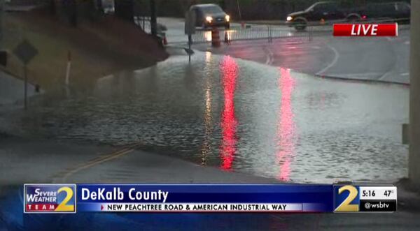 New Peachtree Road is blocked at American Industrial Way in DeKalb County due to ponding.