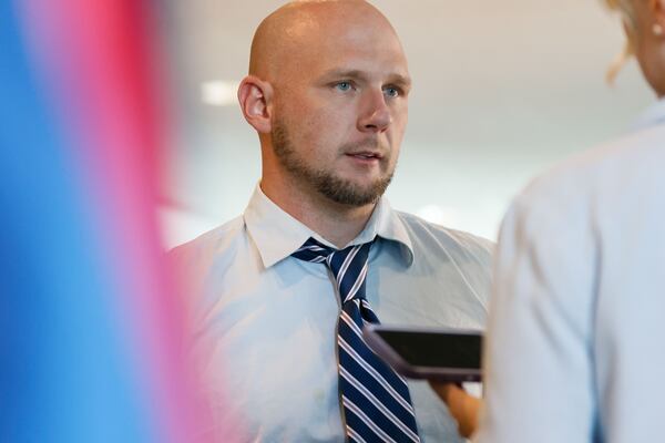 David Andrews, a defendant in a criminal case, speaks to an AJC reporter at the Cobb County Superior Court after Chief Judge Gregory Poole issued a 30-day emergency order on Wednesday. The order suspended filing deadlines and other administrative requirements in civil and criminal cases.
(Miguel Martinez / AJC)