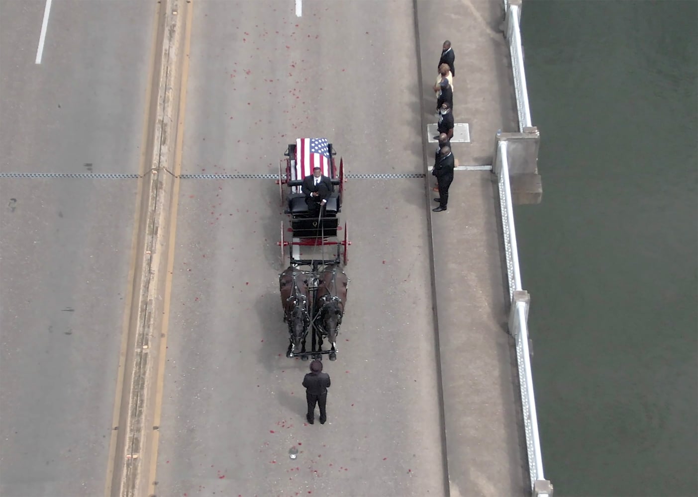 John Lewis crosses Edmund Pettus Bridge for final time