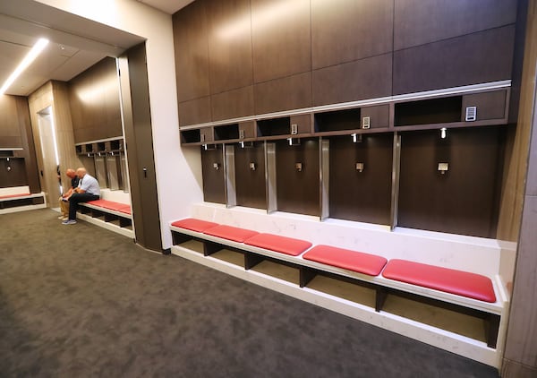 The Atlanta United locker room features soccer style benches for players to sit on rather than chairs.