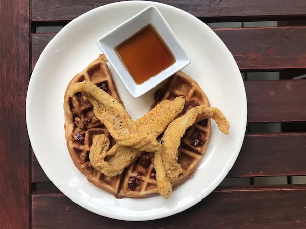 Catfish and Waffles is one of many catfish preparations at Catfish Hox. LIGAYA FIGUERAS / LIGAYA.FIGUERAS@AJC.COM