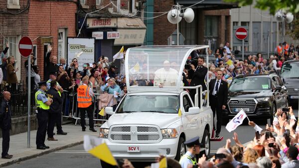 Pope Francis arrives for a visit to St Mary's Pro Cathedral in Dublin to meet with recently-married couples, and couples preparing for the Sacrament of Marriage, as part of his visit to Ireland, Saturday, Aug. 25, 2018.