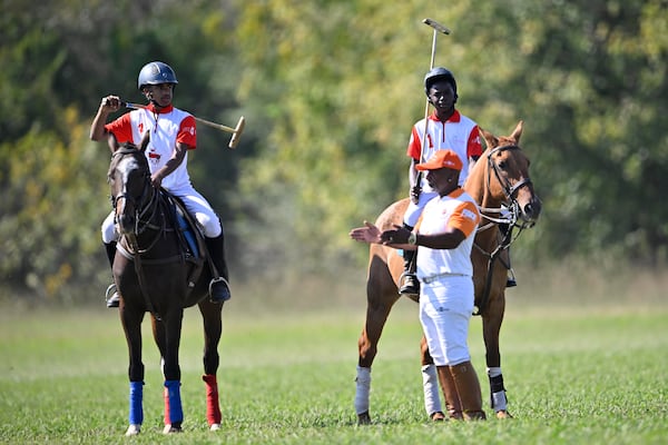 BEST Academy polo team members warm up with their horses during the First Annual Junior Polo Classic on Sunday, Oct. 13, 2024, in Fairburn, GA. (Jim Blackburn for the AJC)