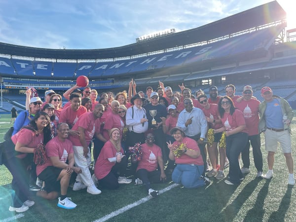 The Georgia House of Representatives team celebrates after defeating the state Senate in a game of kickball at Center Parc Stadium in Atlanta on Wednesday.