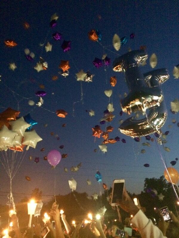 There were lots of balloons at a vigil in memory of Isaiah Reed, Jaime Hernandez and Brandon Gresham, but no discussion about the crime the three teenagers are alleged to have committed. Photo by Bill Torpy