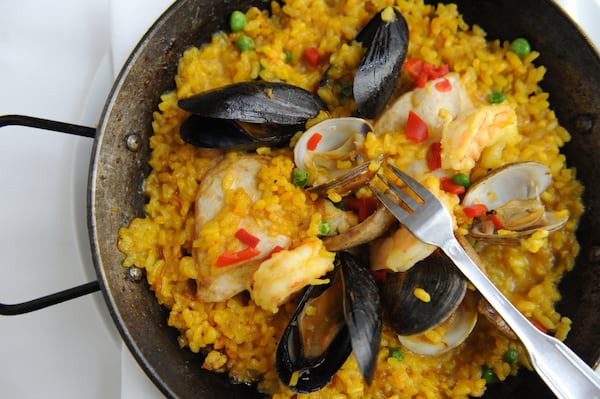 Paella with saffron calasparra rice, mussels, chicken, sausage, clams and shrimp at Babette's. (BECKY STEIN)