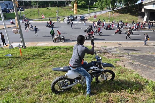 Near University Avenue, protesters try to get on the interstate, and motorcycles broke thru the police line. Hyosub Shin/AJC