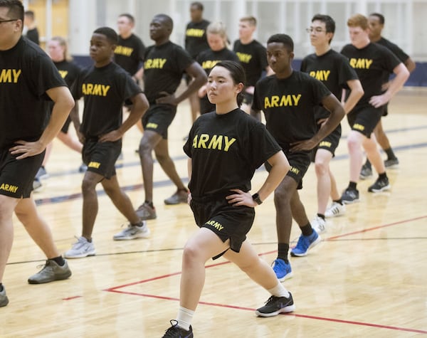 Emory University student Jihea Song (center) spent the last three years in the Army as a combat medic stationed in South Korea. BOB ANDRES / ROBERT.ANDRES@AJC.COM