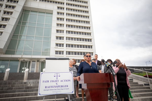 Allegra Lawrence-Hardy, an attorney for Fair Fight Action, speaks outside the Richard B. Russell Federal Building in Atlanta, GA., on April 11, 2022. Last year, Fair Fight Action and other plaintiffs were ordered to repay the state over $231,000 after the organization lost a major, long-running voting rights lawsuit. (Jenn Finch for the AJC)