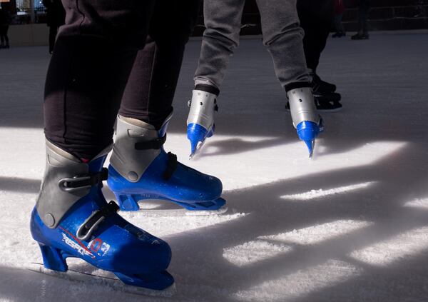 Skaters take to the ice at the Have an Ice Day rink in downtown Sugar Hill on Saturday afternoon, December 26, 2020. Pandemic precautions were in effect at the largest portable ice-skating rink in the Southeast. The event in the Gwinnett County city was held Friday through Sunday. (Photo: Ben Gray for The Atlanta Journal-Constitution)