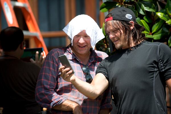 Greg Nicotero and Norman Reedus as Daryl Dixon - The Walking Dead _ Season 5, Episode 5 _ BTS - Photo Credit: Gene Page/AMC