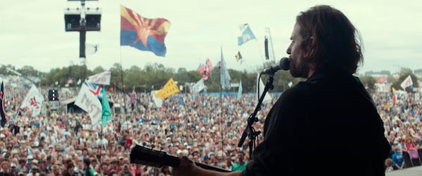 Bradley Cooper stars as Jackson Maine, a successful roots-rocker who is battling demons when he falls in love with Ally, played by Lady Gaga, in "A Star is Born." Photo: Courtesy of Warner Bros. Pictures