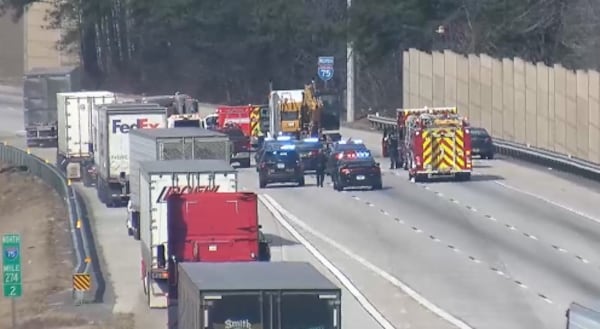 A tractor-trailer driver was shot on I-75 in Cobb County on Feb. 16, according to police.