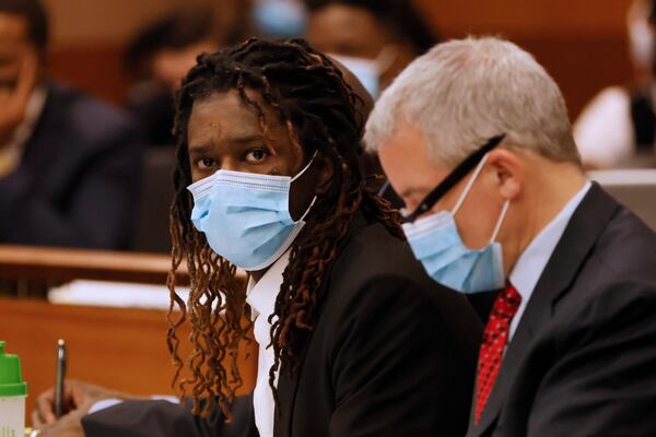 Atlanta rapper Young Thug sits next to attorney Brian Steel during jury selection in his Fulton County gang trial on Monday, Feb 6, 2023. Miguel Martinez / miguel.martinezjimenez@ajc.com