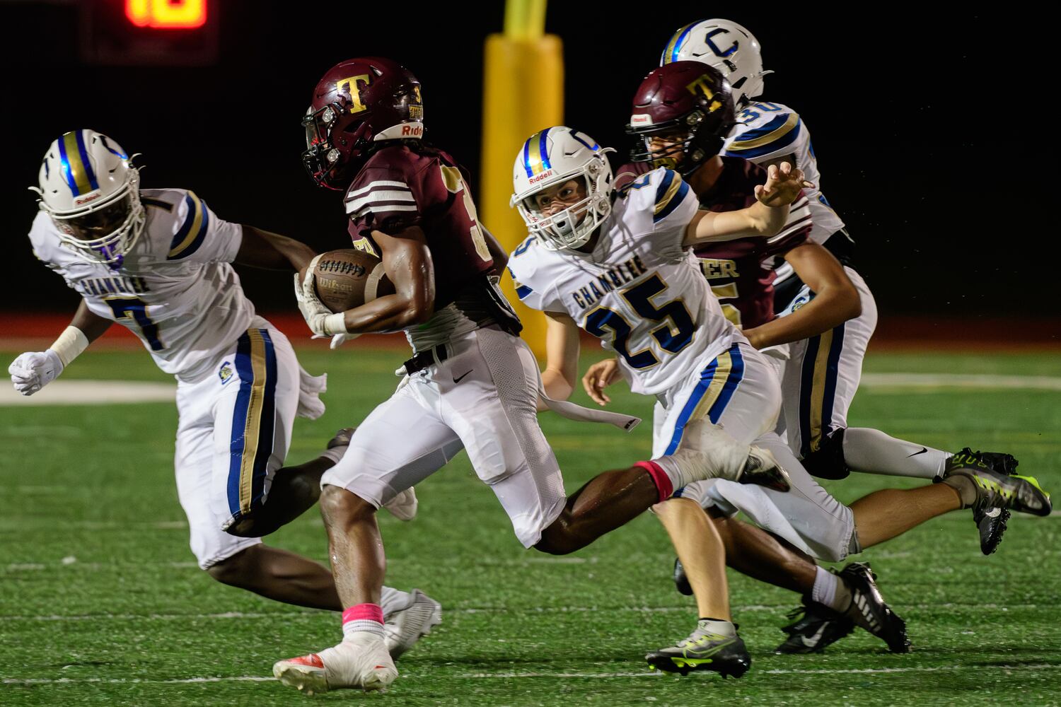 Tucker's Jordan McCoy runs the ball during the high school football game against Chamblee on Friday. Tucker won 40-14 (Jamie Spaar for the Atlanta Journal Constitution)